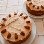 Coffee Cake with butter icing and decorated with pecans
