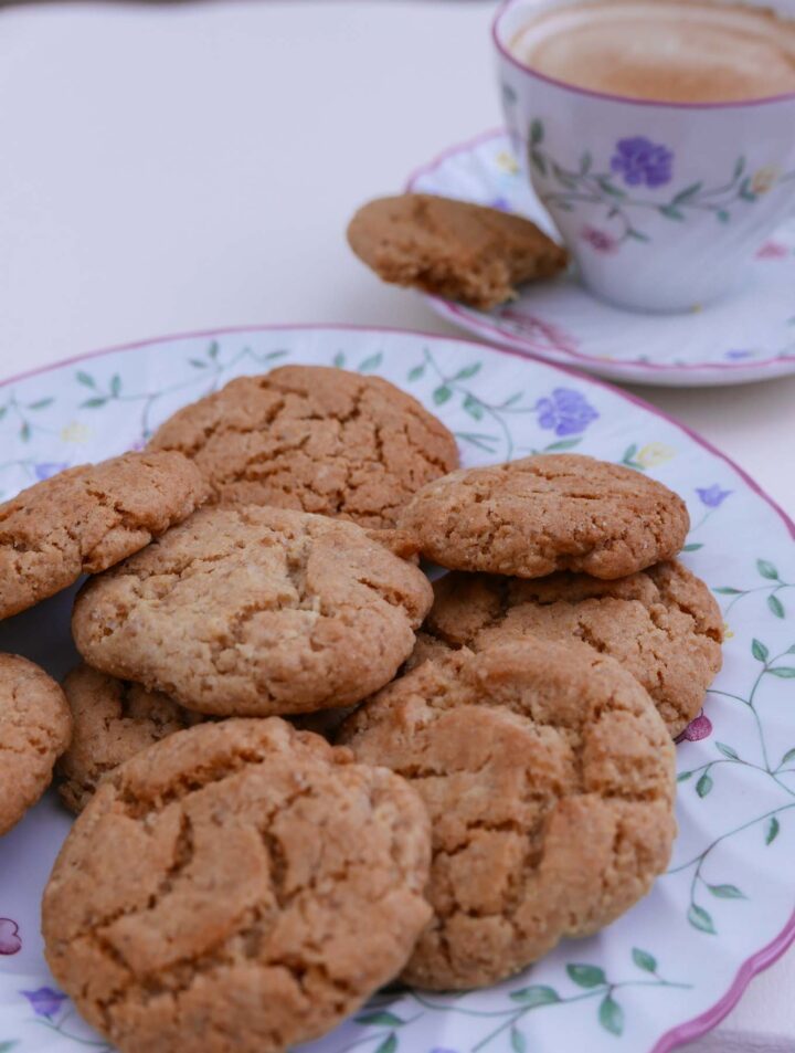 Ginger Biscuits on a plate with a cup of tea