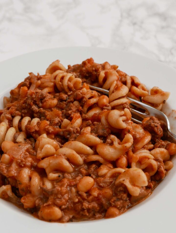 One-pot mince and pasta in a white bowl