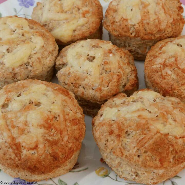 Seven cheese scones on a flowered plate 