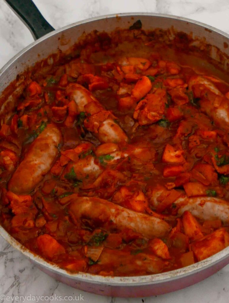 Sausage and apple casserole in a large shallow pan