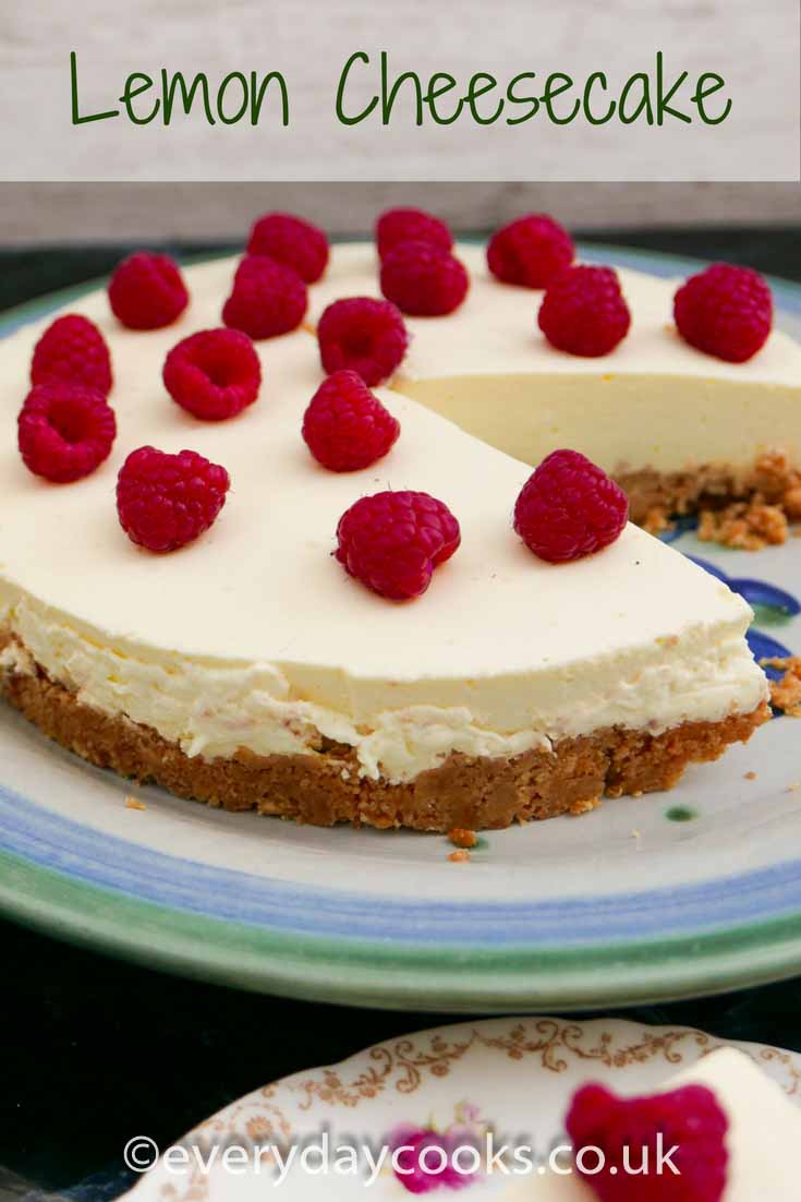 Easy Lemon Cheesecake on a plate with a slice on a small plate