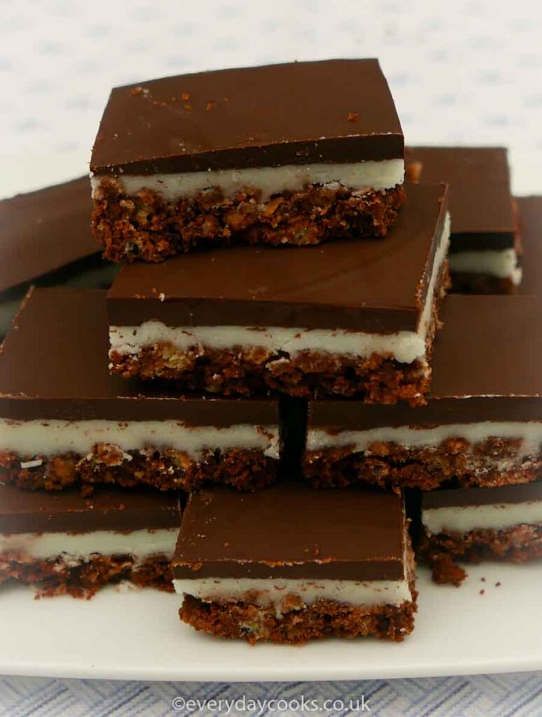 A stack of Chocolate Mint Crispies on a white plate