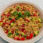 Cracked Wheat Salad in a serving dish with fresh herbs