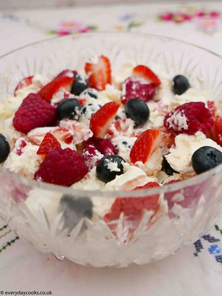 A glass bowl of Eton Mess