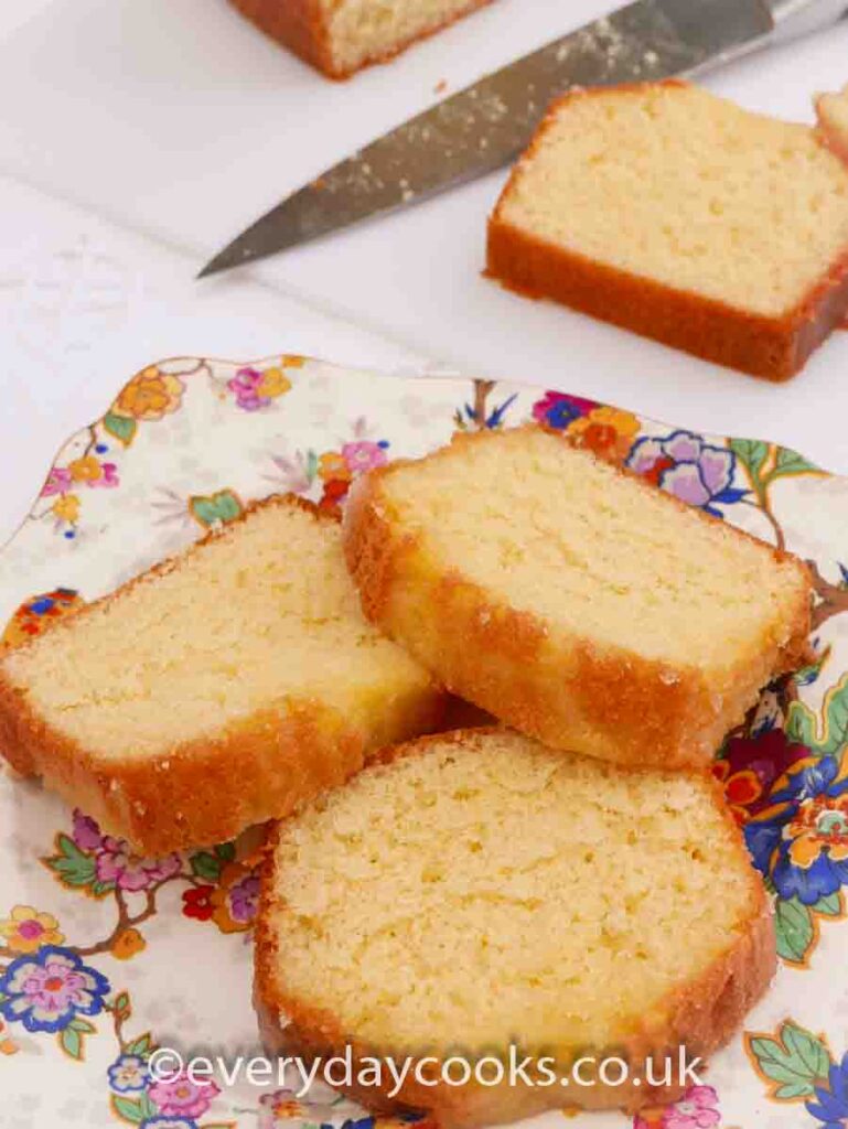 Slices of Crunchy Lemon Drizzle Loaf on a patterned plate 