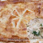 Chicken and Broccoli Pie with a slice of pastry cut out