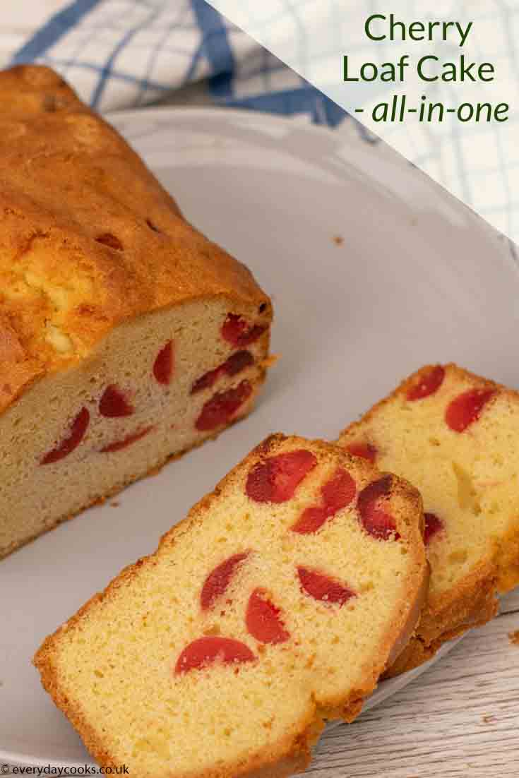 Slices of cherry cake on a white plate with the rest of the cake in the background.