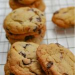 Pecan Chocolate Chip Cookies on a wire cooling rack