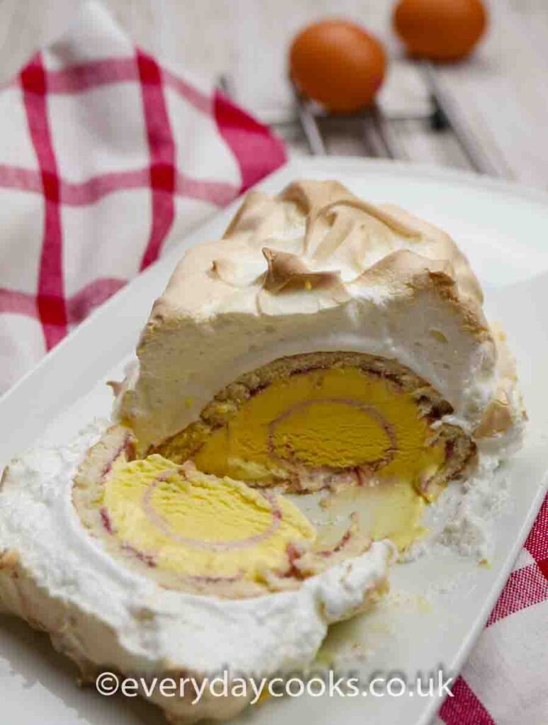 Slices of Easy Baked Alaska on a white plate