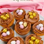8 Easter Nest Cupcakes full of mini eggs on a grey plate