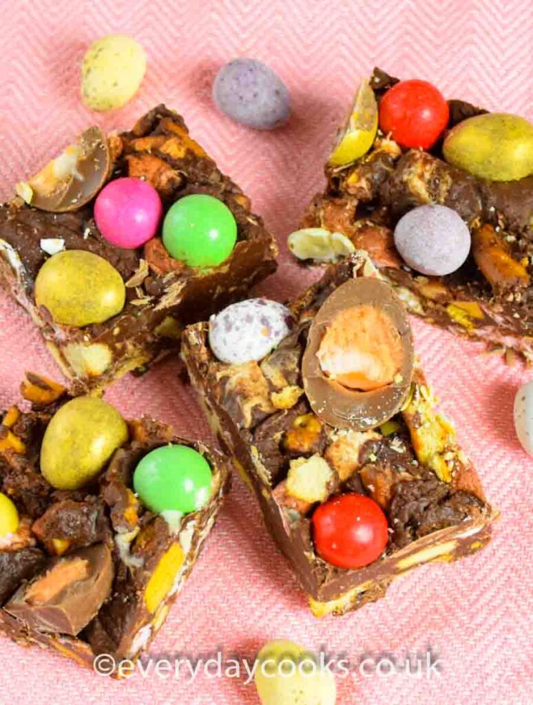 Pieces of Easter Rocky Road on a pink cloth.