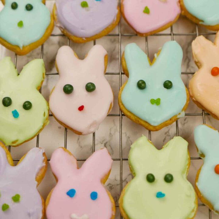 Iced Easter Bunny Biscuits and chicks in a variety of colours on a wire rack