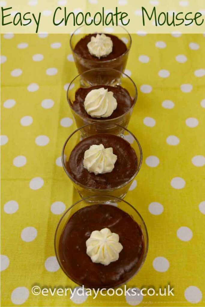 4 glasses of Easy Chocolate Mousse decorated with cream swirls