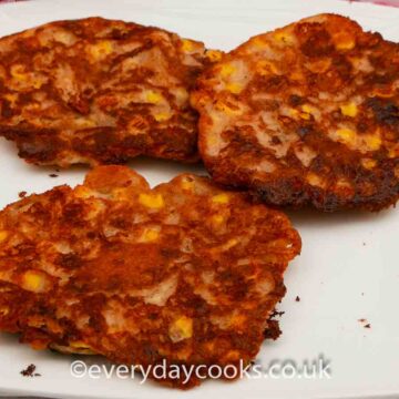 3 Sweetcorn Fritters on a white plate