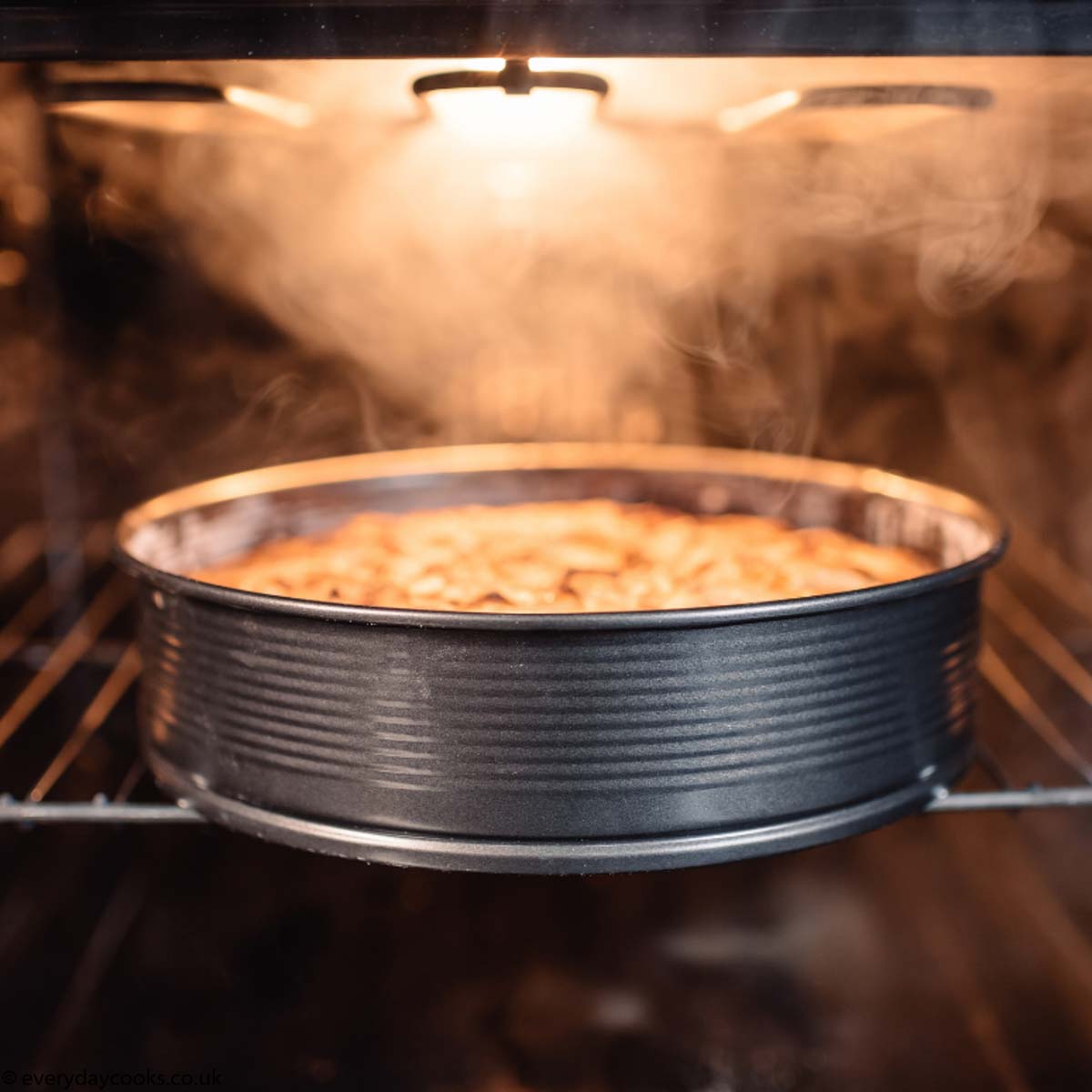 Cake cooking in an oven