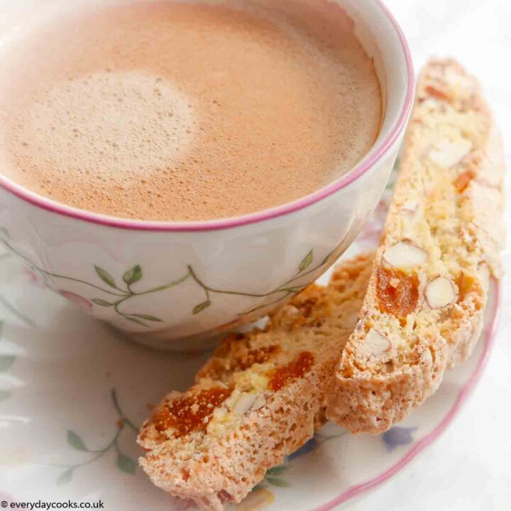 Apricot and almond biscotti with a cup of coffee.