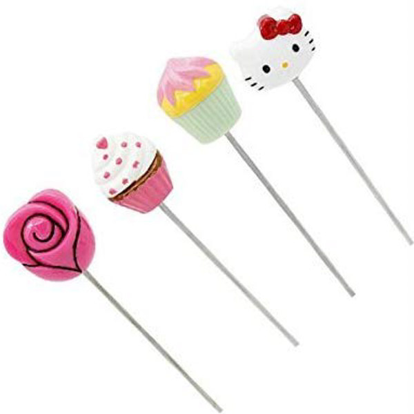 Four novelty cupcake testers