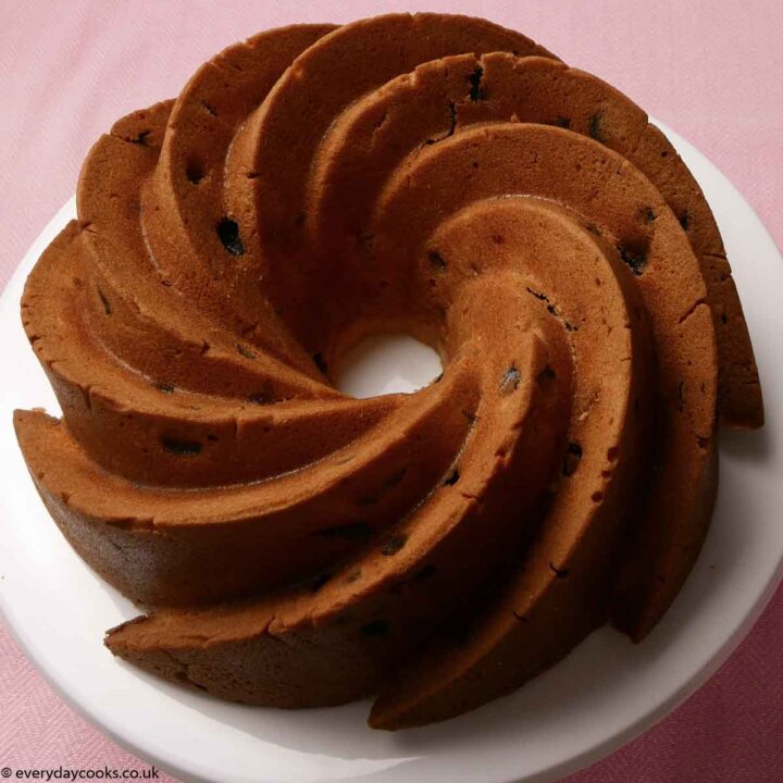 Un-iced Fruit Bundt Cake on a white plate