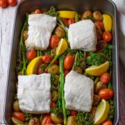 Easy Cod Traybake. Roast vegetables and cod fillets in roasting tin.