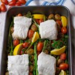 Easy Cod Traybake. Roast vegetables and cod fillets in roasting tin.