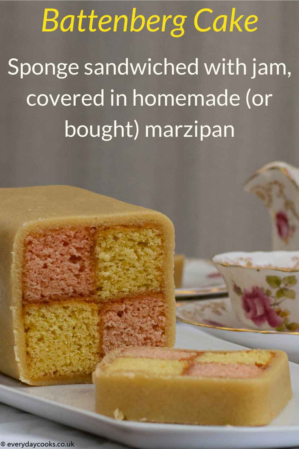 Easy Battenberg Cake on a white plate with 2 slices cut, with a cup of tea.