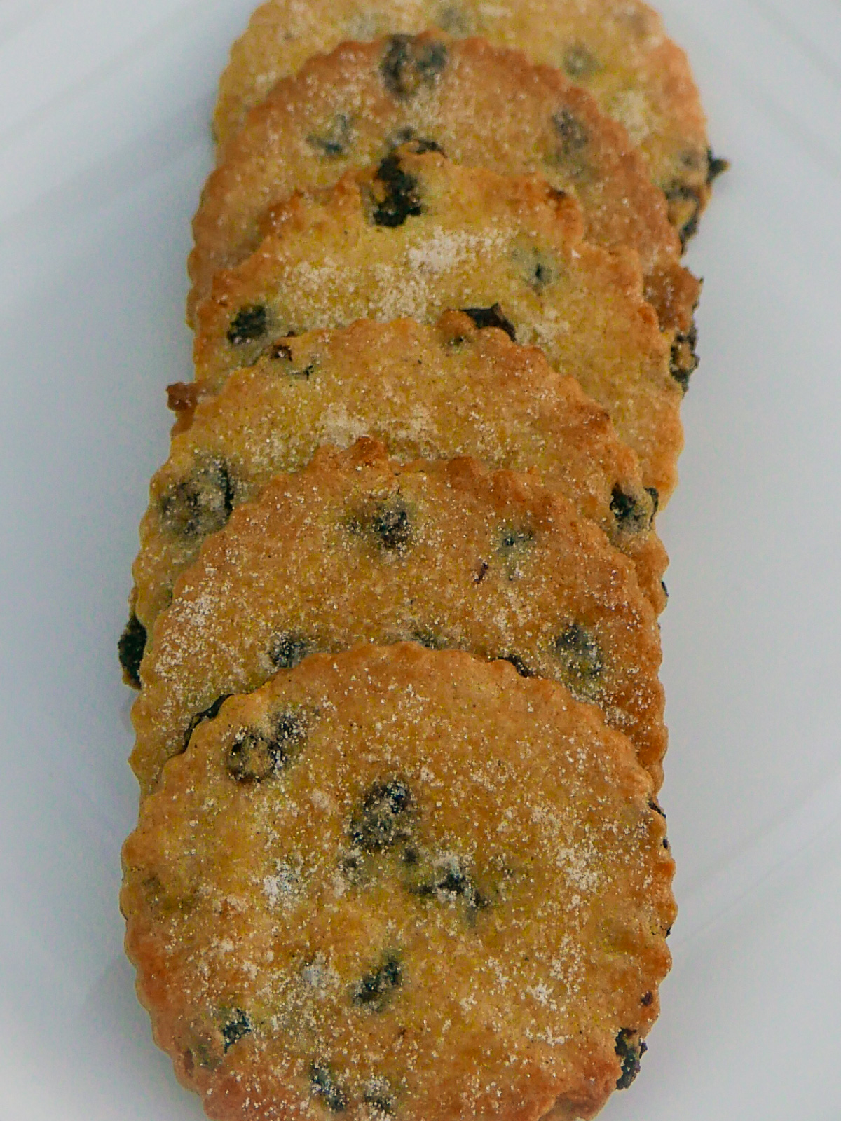 A row of traditional Easter Biscuits on a white plate